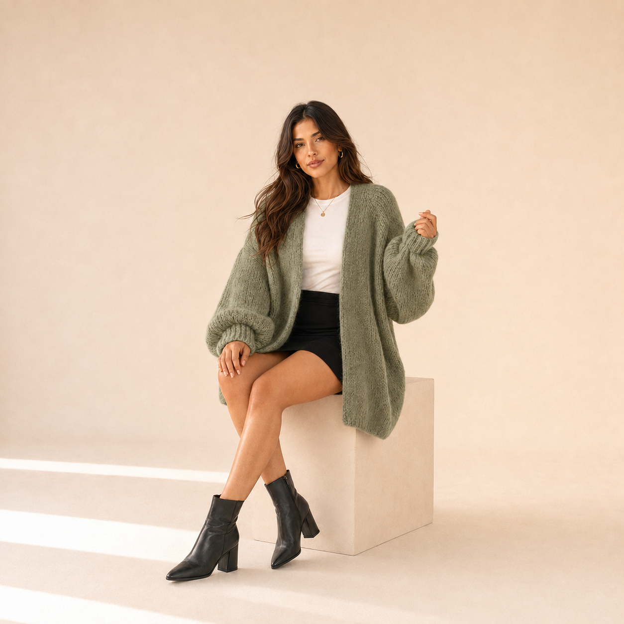 Woman modeling The Sienne Cloud Cardigan in Sage Green