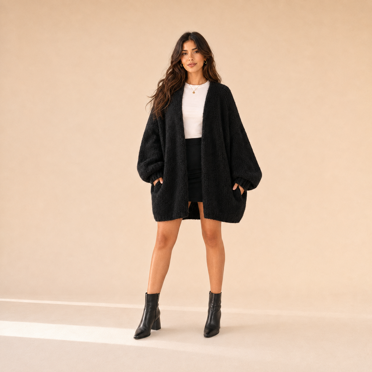 Woman modeling The Sienne Cloud Cardigan in Black