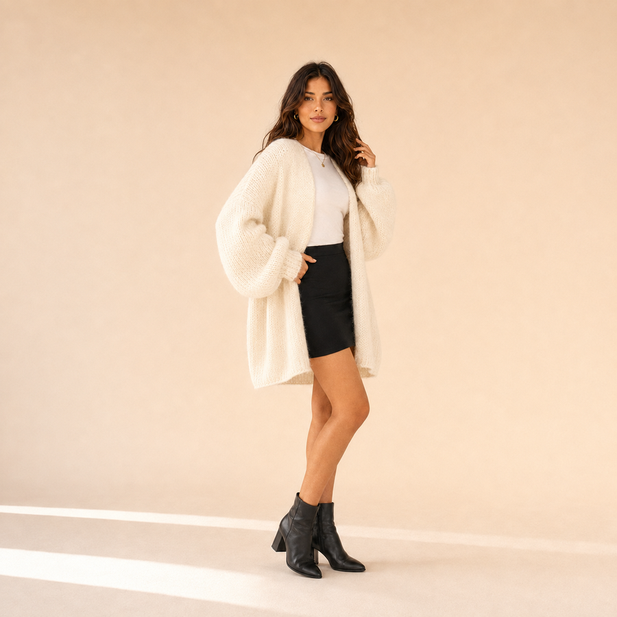 Woman modeling The Sienne Cloud Cardigan in Cream