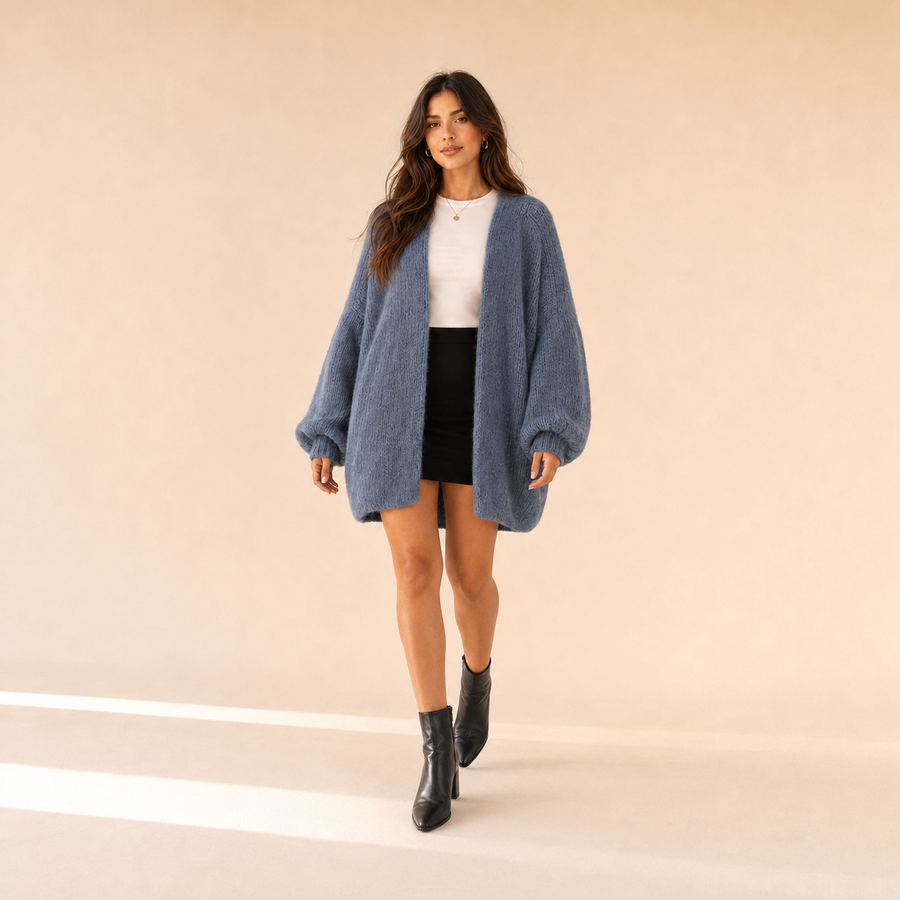 Woman modeling The Sienne Cloud Cardigan in Dusty Blue